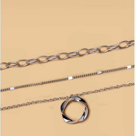 Geometric round charm layered necklace. - Picture 2 of 3